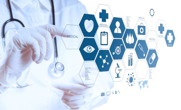 Gloved hand manipulating 3D medical display