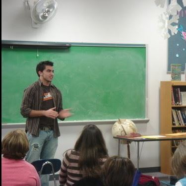 Students present on the power of assets in their lives at a Spencer School PTA meeting